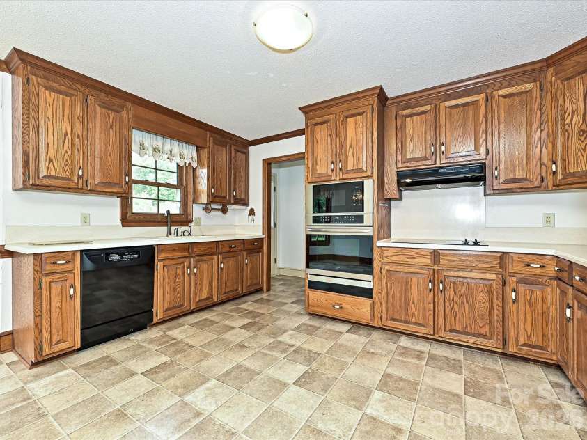 4165 Wrangler Drive, Concord, NC 28027.  MLS# CAR4377327, YatesRealty ID 17790. 