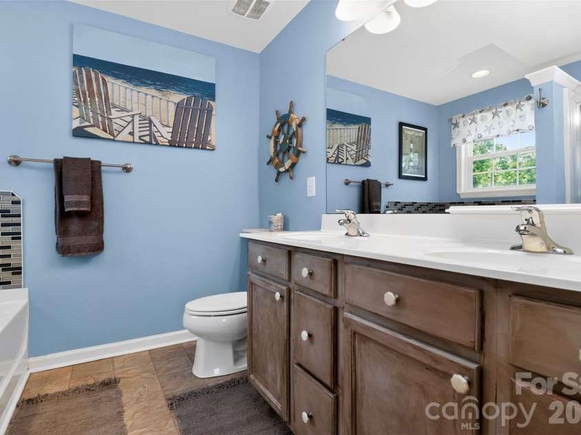 7287 Mill Ruins Avenue, Concord, NC 28025.  MLS# CAR4376339, YatesRealty ID 17792. 