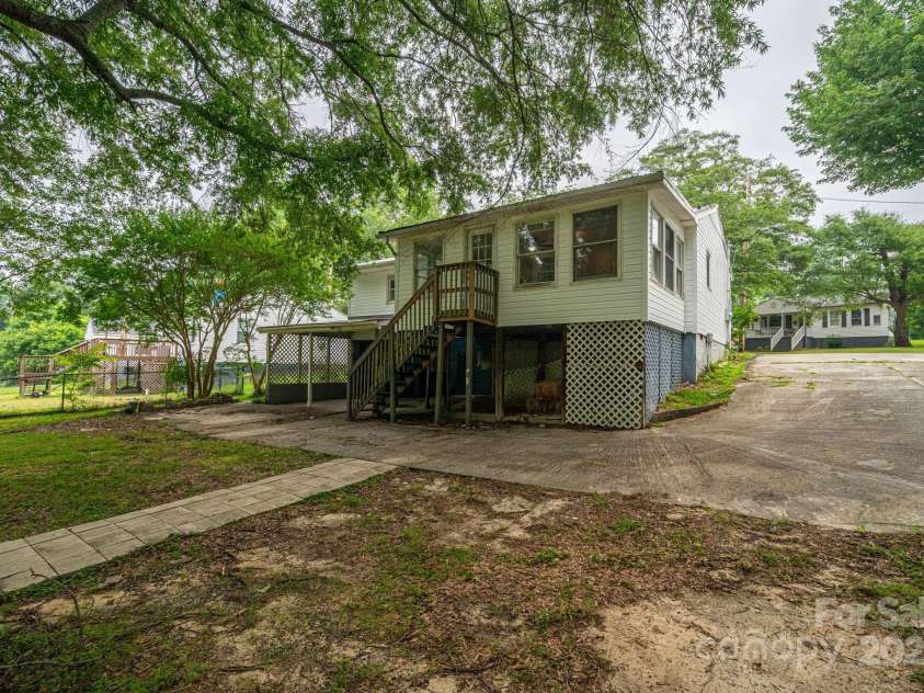 535 Norman Fair Avenue, Lincolnton, NC 28092.  MLS# CAR4266150, YatesRealty ID 17793. Back yard and Driveway
