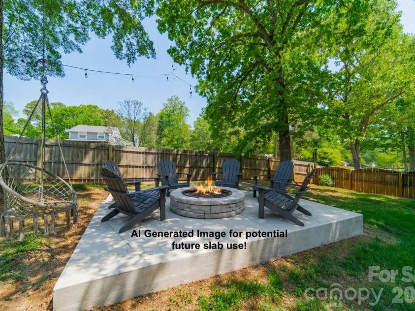 801 Sonata Place, Charlotte, NC 28211.  MLS# CAR4369314, YatesRealty ID 17796. Potential fire pit area on concrete slab
