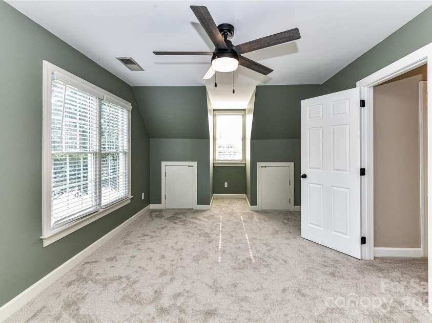 4637 Shannamara Drive, Matthews, NC 28104.  MLS# CAR4264380, YatesRealty ID 17797. Bonus Room with attic storage space & ceiling fan/light!