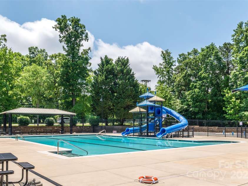 4637 Shannamara Drive, Matthews, NC 28104.  MLS# CAR4264380, YatesRealty ID 17797. Community Pool!