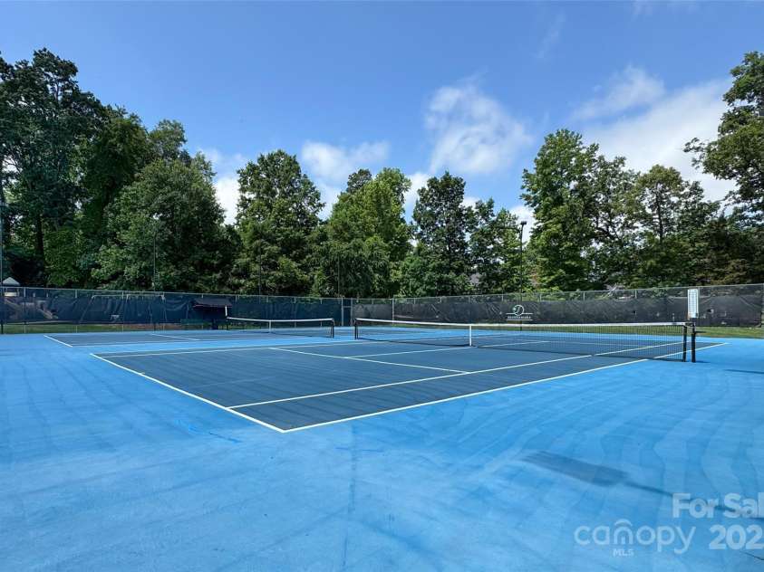4637 Shannamara Drive, Matthews, NC 28104.  MLS# CAR4264380, YatesRealty ID 17797. Community Tennis Courts!