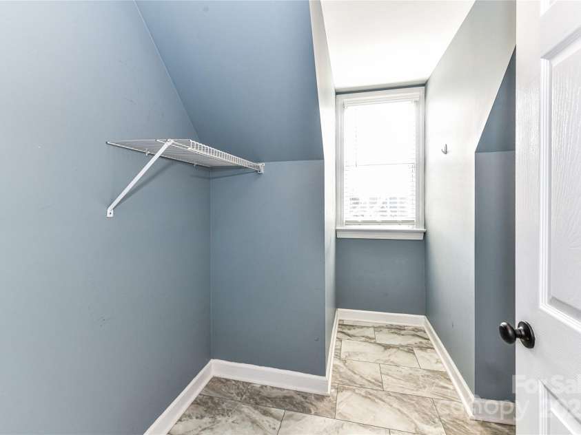4637 Shannamara Drive, Matthews, NC 28104.  MLS# CAR4264380, YatesRealty ID 17797. Laundry Room on upper level!
