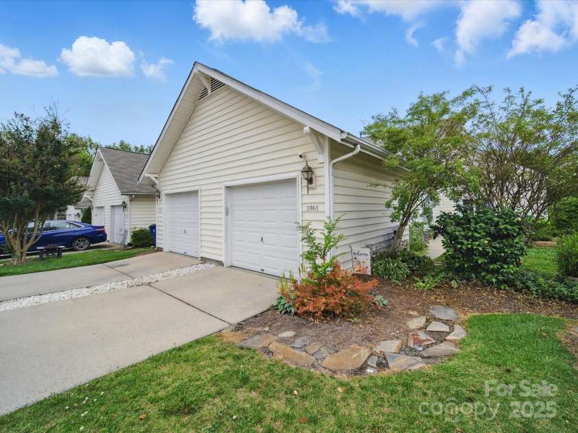 1061 Woodglen Lane, Matthews, NC 28104.  MLS# CAR4265056, YatesRealty ID 17799. 