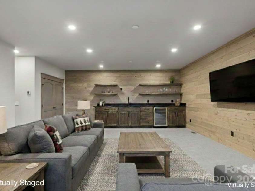 102 Iga Trail, Maggie Valley, NC 28751.  MLS# CAR4331982, YatesRealty ID 1780. Room including wet bar is Virtually Staged 