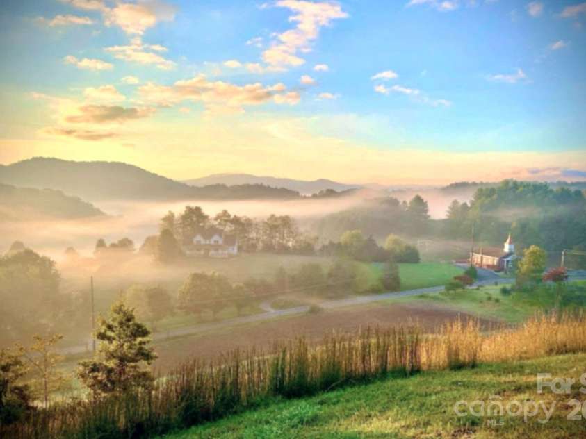 2521 Double Island Road, Green Mountain, NC 28740.  MLS# CAR4252012, YatesRealty ID 17802. 