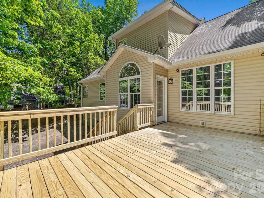 7520 Carmel Road, Charlotte, NC 28226.  MLS# CAR4372217, YatesRealty ID 17802. Brand new, LARGE permitted deck