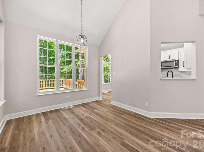 7520 Carmel Road, Charlotte, NC 28226.  MLS# CAR4372217, YatesRealty ID 17802. Dining room area by kitchen