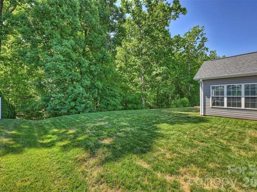 2500 Grayson Parkway, Monroe, NC 28110.  MLS# CAR4373636, YatesRealty ID 17804. Backyard