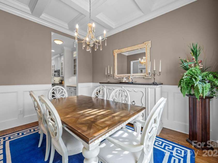 4004 Saint Andrews Court, Cramerton, NC 28032.  MLS# CAR4265985, YatesRealty ID 17805. Classic dining room with coffered ceiling, wainscoting