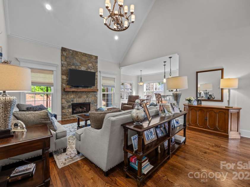 4004 Saint Andrews Court, Cramerton, NC 28032.  MLS# CAR4265985, YatesRealty ID 17805. Floor-to-ceiling stone fireplace, gas logs, custom mantle