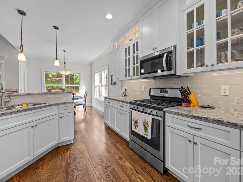 4004 Saint Andrews Court, Cramerton, NC 28032.  MLS# CAR4265985, YatesRealty ID 17805. Lots of soft close cabinets & granite counter space, gas range