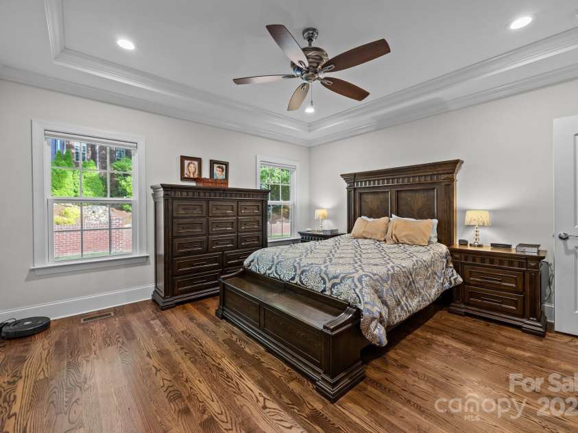 4004 Saint Andrews Court, Cramerton, NC 28032.  MLS# CAR4265985, YatesRealty ID 17805. Main level primary bedroom