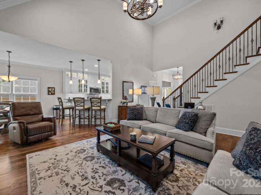 4004 Saint Andrews Court, Cramerton, NC 28032.  MLS# CAR4265985, YatesRealty ID 17805. Open hardwood staircase with iron balusters