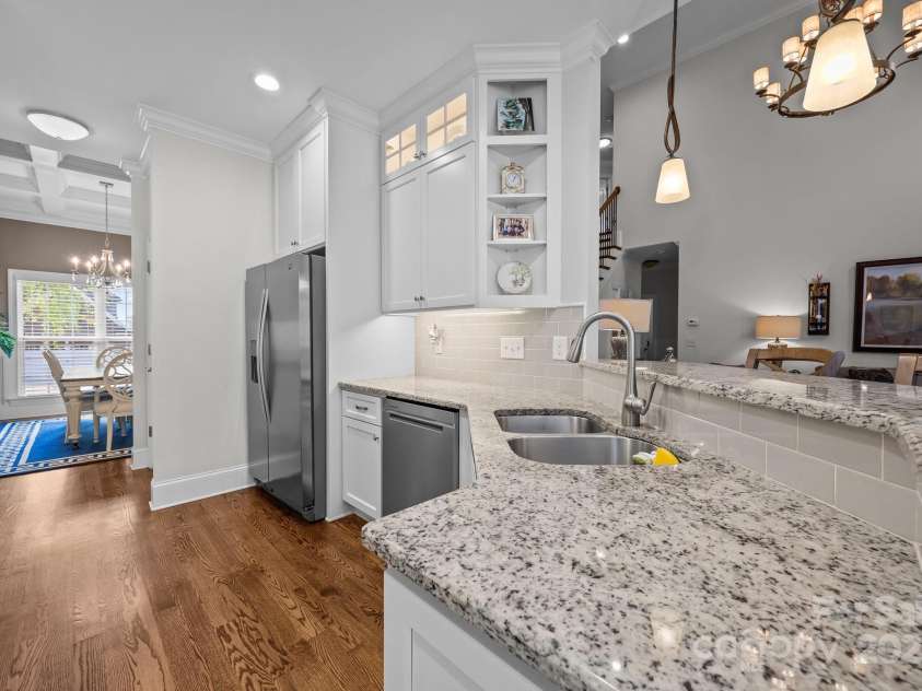 4004 Saint Andrews Court, Cramerton, NC 28032.  MLS# CAR4265985, YatesRealty ID 17805. Open kitchen layout with bar height seating