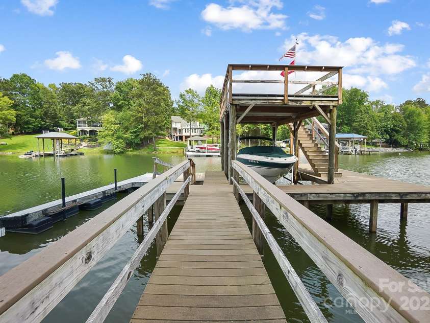 2354 Valelake Road, York, SC 29745.  MLS# CAR4266023, YatesRealty ID 17806. Covered dock with boat lift and sunbathing deck.
