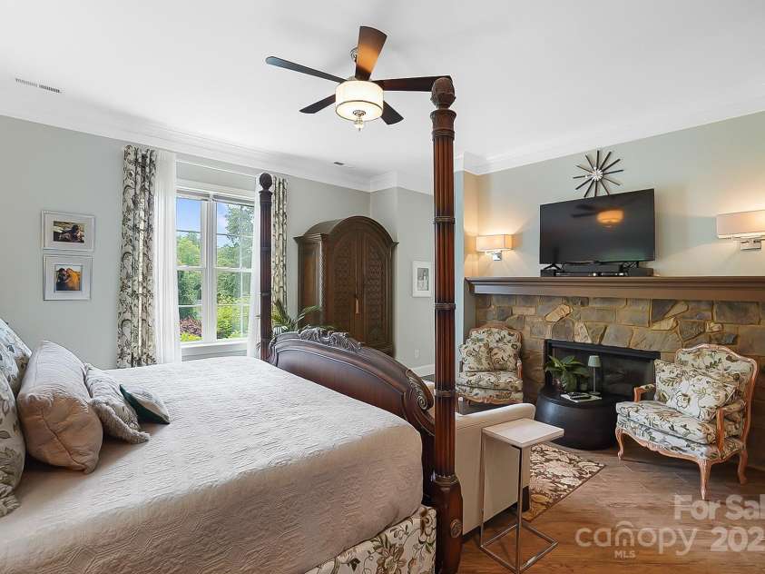 2354 Valelake Road, York, SC 29745.  MLS# CAR4266023, YatesRealty ID 17806. Fireplace in the primary bedroom.