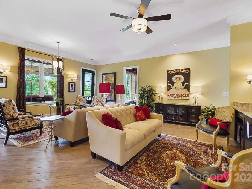 2354 Valelake Road, York, SC 29745.  MLS# CAR4266023, YatesRealty ID 17806. Main level living room/great room leads out onto the covered porch overlooking Lake Wylie.