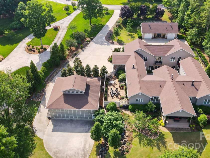 2354 Valelake Road, York, SC 29745.  MLS# CAR4266023, YatesRealty ID 17806. One of a kind, lakefront home with private boat ramp, 10-plus car garage that was also a hangar for a Seaplane.