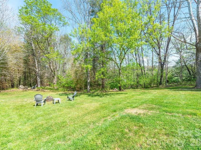 85 Cody Embler Road, Alexander, NC 28701.  MLS# CAR4370599, YatesRealty ID 17807. A gardener's dream
