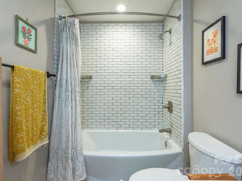 85 Cody Embler Road, Alexander, NC 28701.  MLS# CAR4370599, YatesRealty ID 17807. Tub for relaxing