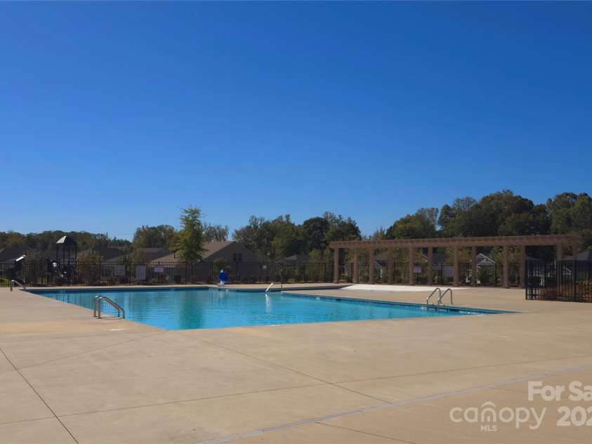 9525 Festival Way, Charlotte, NC 28215.  MLS# CAR4263190, YatesRealty ID 17807. Hello Summer! Enjoy the community pool
