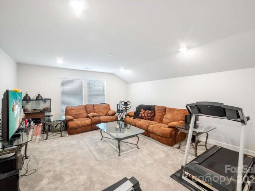9525 Festival Way, Charlotte, NC 28215.  MLS# CAR4263190, YatesRealty ID 17807. Second Floor bonus room.