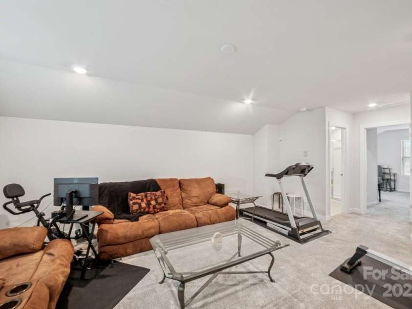 9525 Festival Way, Charlotte, NC 28215.  MLS# CAR4263190, YatesRealty ID 17807. Second Floor bonus room.