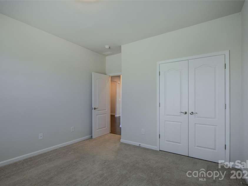 15429 Topanga Drive, Charlotte, NC 28278.  MLS# CAR4305011, YatesRealty ID 17808. Guest bedroom 1 on the main