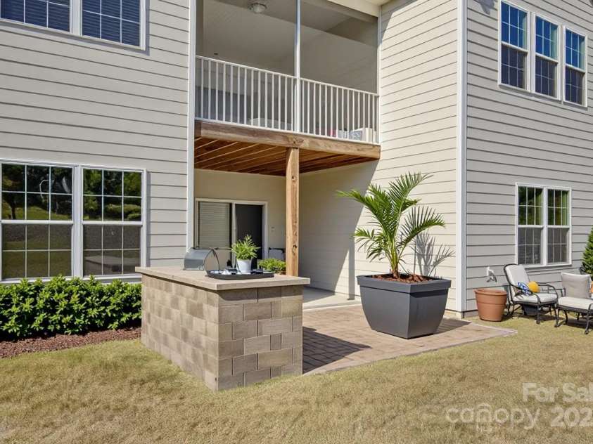 15429 Topanga Drive, Charlotte, NC 28278.  MLS# CAR4305011, YatesRealty ID 17808. Virtually staged back patio