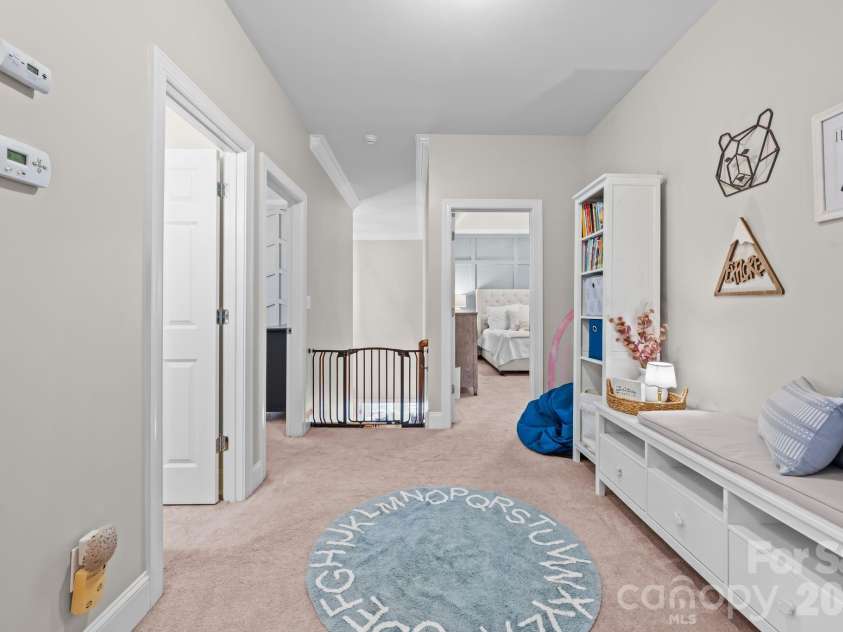 14003 Ballantyne Meadows Drive, Charlotte, NC 28277.  MLS# CAR4372883, YatesRealty ID 17810. Open hallway between all bedrooms useful for kids desks or additional storage 