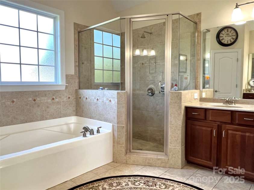 3000 J R Court, Stanley, NC 28164.  MLS# CAR4254396, YatesRealty ID 17811. Primary bathroom.