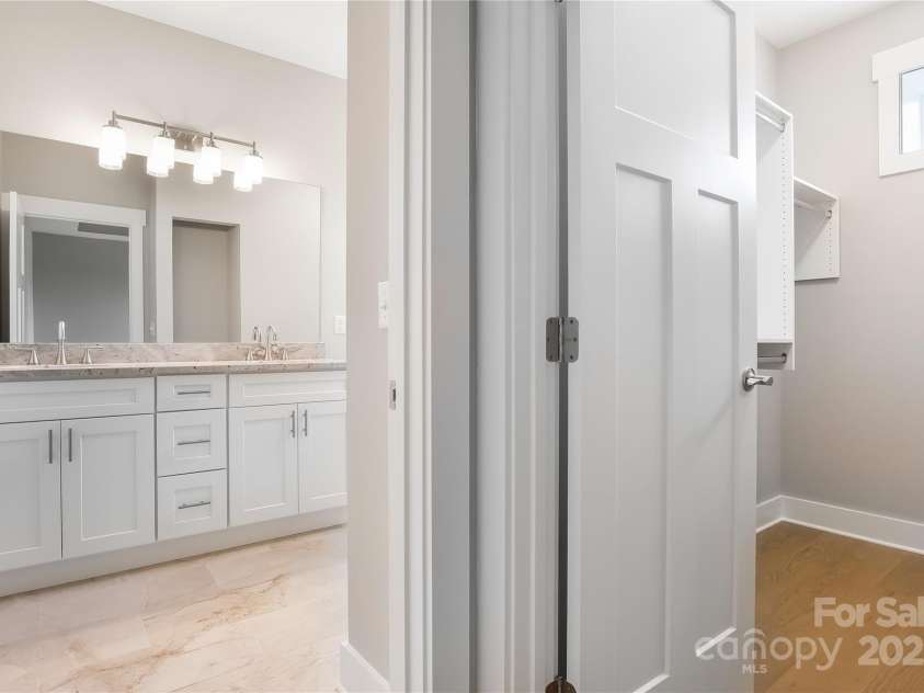 48 Creekside View Drive, Asheville, NC 28804.  MLS# CAR4046496, YatesRealty ID 17815. Additional view of primary closet and bathroom