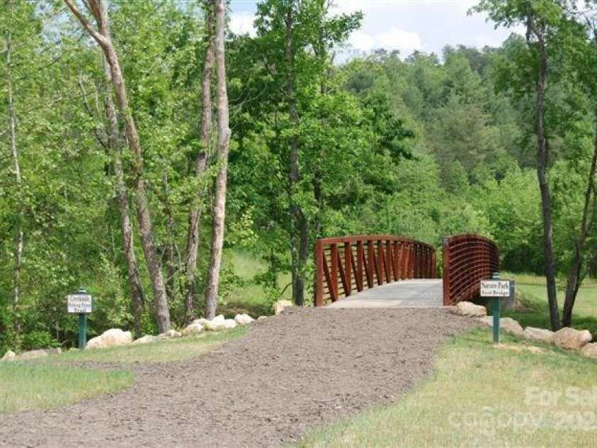 48 Creekside View Drive, Asheville, NC 28804.  MLS# CAR4046496, YatesRealty ID 17815. Bridge over Reems Creek