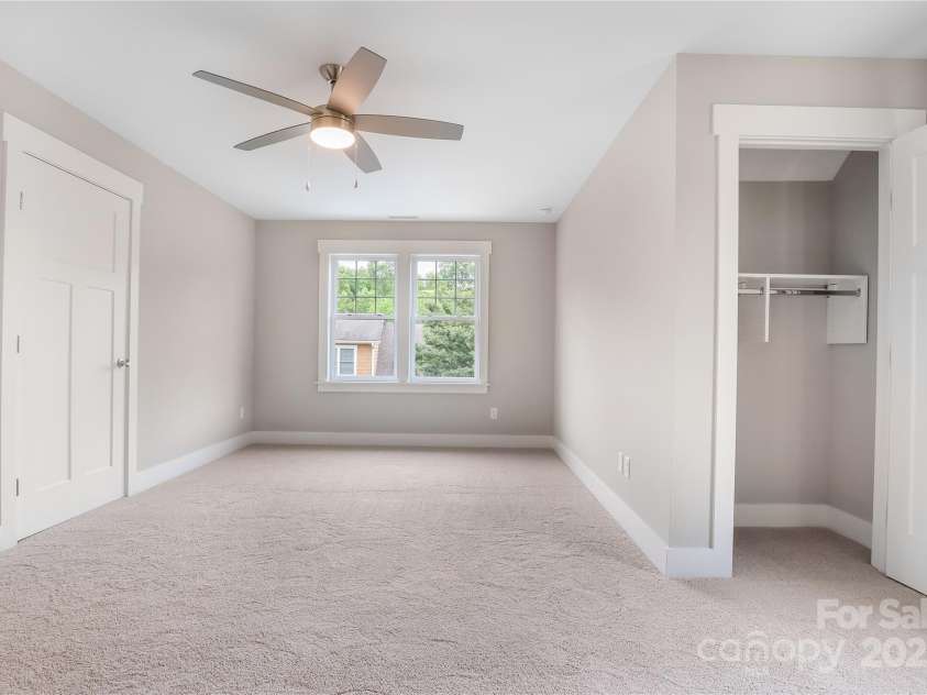 48 Creekside View Drive, Asheville, NC 28804.  MLS# CAR4046496, YatesRealty ID 17815. Upstairs 3rd bedroom (over garage) this room has 2 closets and there is a small amount of attic space.