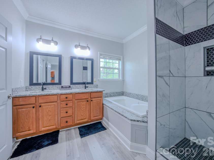 27 Garland Ball Drive, Alexander, NC 28701.  MLS# CAR4371775, YatesRealty ID 17817. Primary Bathroom