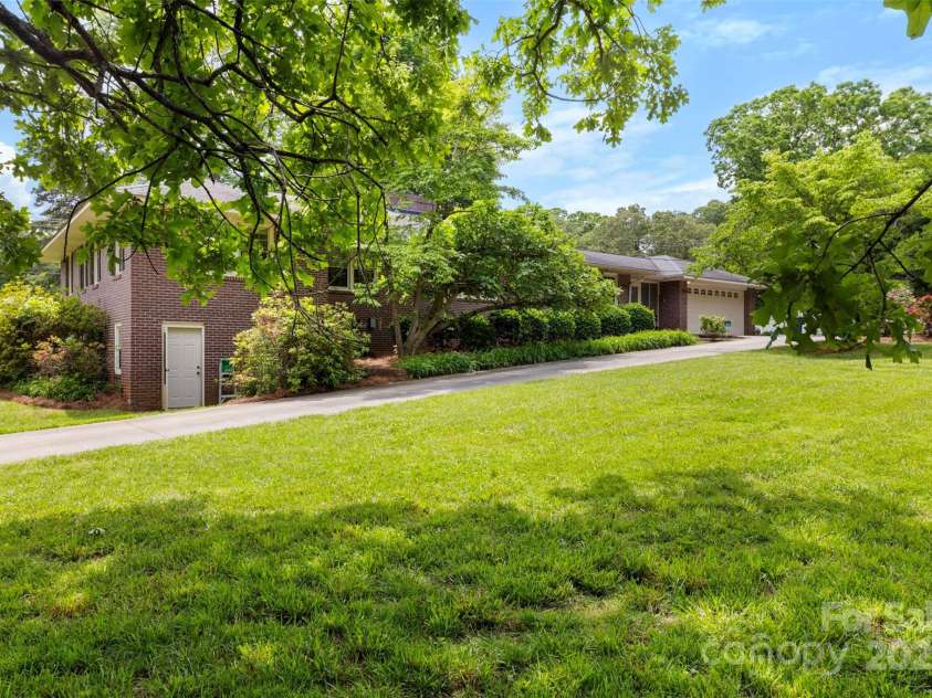 2410 Armstrong Park Drive, Gastonia, NC 28054.  MLS# CAR4253353, YatesRealty ID 17819. Full back view of home