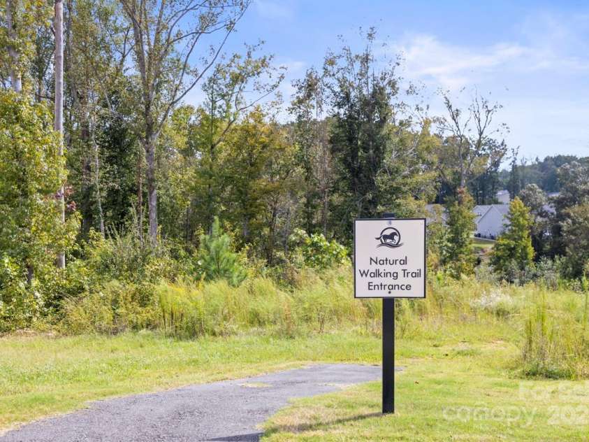 329 Secretariat Drive, Iron Station, NC 28080.  MLS# CAR4253728, YatesRealty ID 17822. Community nature trail at the end of the cut-de-sac