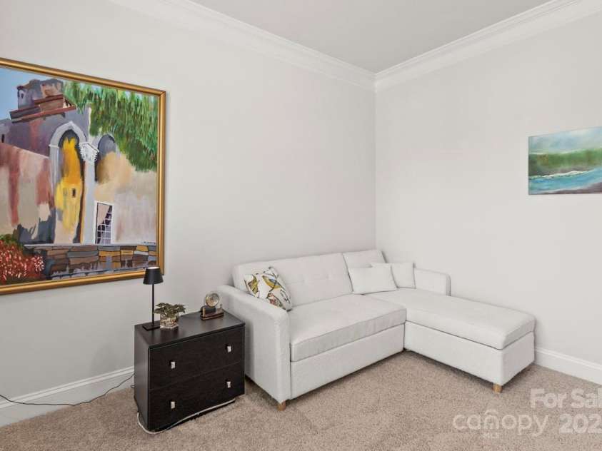 329 Secretariat Drive, Iron Station, NC 28080.  MLS# CAR4253728, YatesRealty ID 17822. Crown molding also adorns the second bedroom