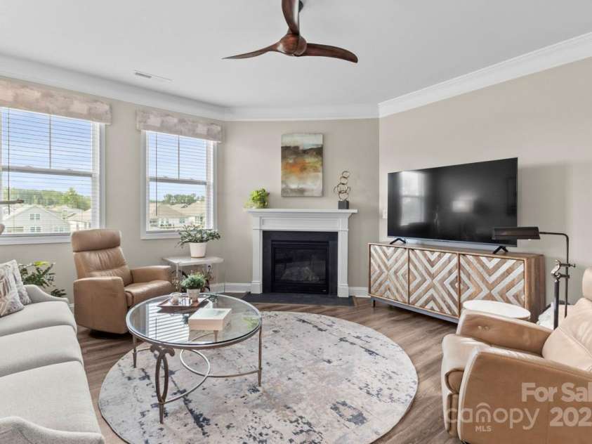 329 Secretariat Drive, Iron Station, NC 28080.  MLS# CAR4253728, YatesRealty ID 17822. Crown molding and a sleek ceiling fan add ambiance