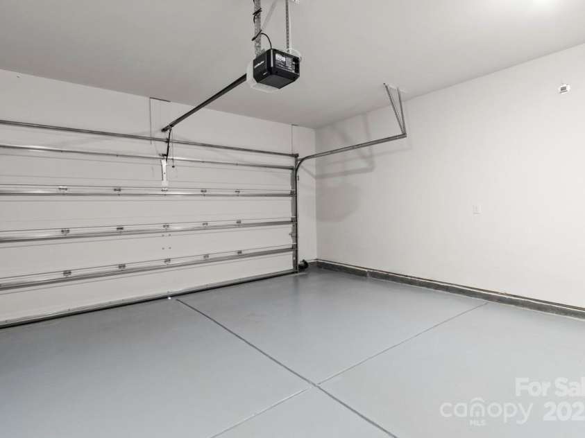 329 Secretariat Drive, Iron Station, NC 28080.  MLS# CAR4253728, YatesRealty ID 17822. Finished garage with epoxy floor
