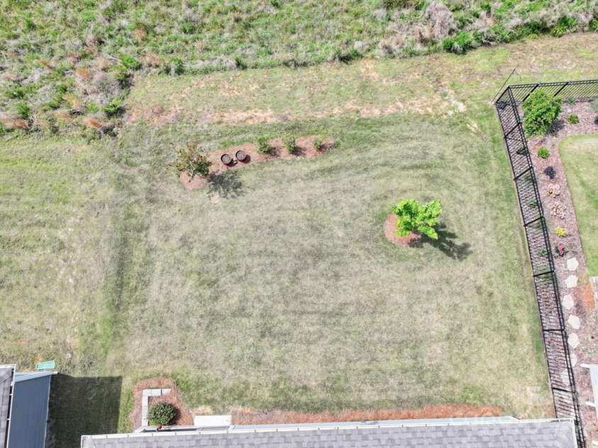 329 Secretariat Drive, Iron Station, NC 28080.  MLS# CAR4253728, YatesRealty ID 17822. Gorgeous, flat back yard