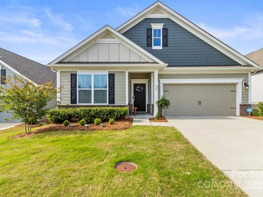 329 Secretariat Drive, Iron Station, NC 28080.  MLS# CAR4253728, YatesRealty ID 17822. Immense curb appeal, fiber cement siding