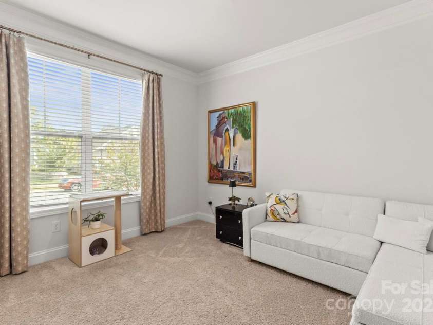 329 Secretariat Drive, Iron Station, NC 28080.  MLS# CAR4253728, YatesRealty ID 17822. Neutral paint and carpet in the second bedroom