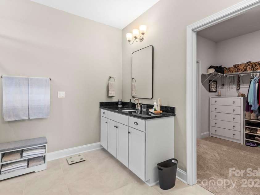 329 Secretariat Drive, Iron Station, NC 28080.  MLS# CAR4253728, YatesRealty ID 17822. Oversize tile flooring adds beauty and practicality