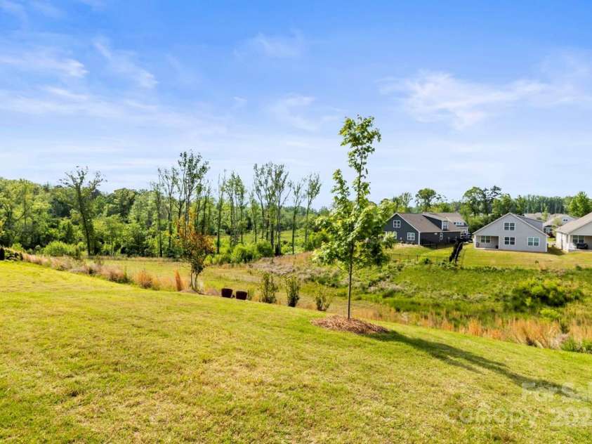 329 Secretariat Drive, Iron Station, NC 28080.  MLS# CAR4253728, YatesRealty ID 17822. Premium lot backs up to common open space owned by the community