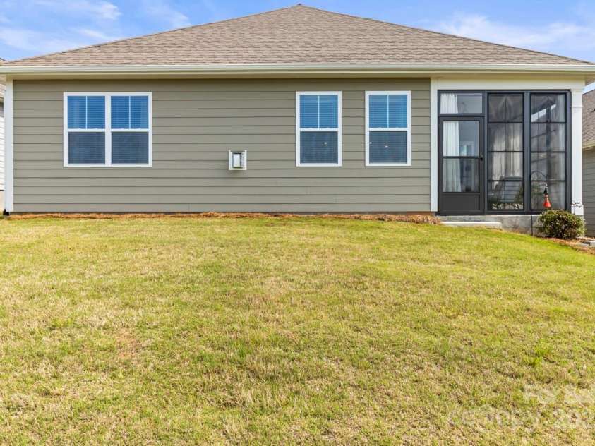 329 Secretariat Drive, Iron Station, NC 28080.  MLS# CAR4253728, YatesRealty ID 17822. Rear view of the immaculate home