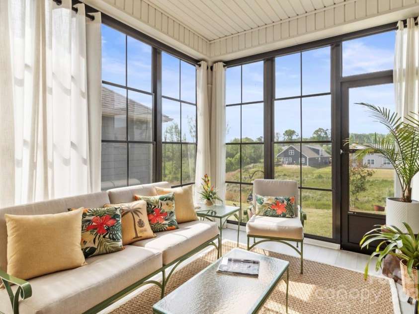 329 Secretariat Drive, Iron Station, NC 28080.  MLS# CAR4253728, YatesRealty ID 17822. The sunroom is the ideal place to relax, and your pets will love soaking up the sun
