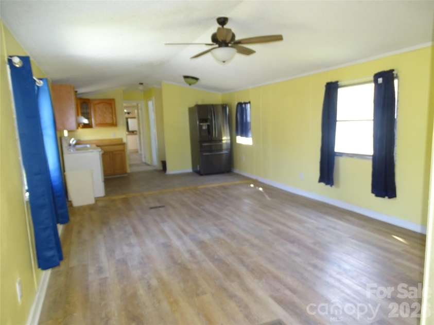 453 Riverview Lane, Lexington, NC 27292.  MLS# CAR4360894, YatesRealty ID 17823. Living room to the kitchen